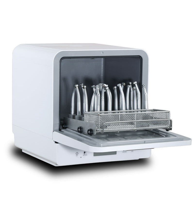 Clean-40 instrument washer from a second angle, showing the loaded handpiece rack and the open door
